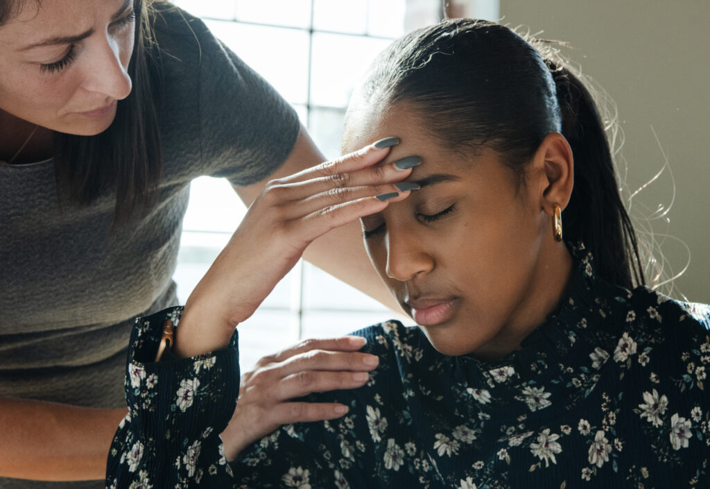 woman feeling anxious meeting with therapist