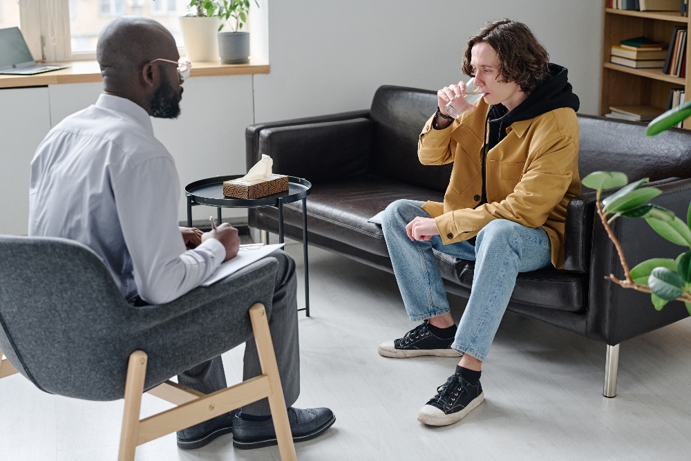 young man sitting in therapist office in walnut california