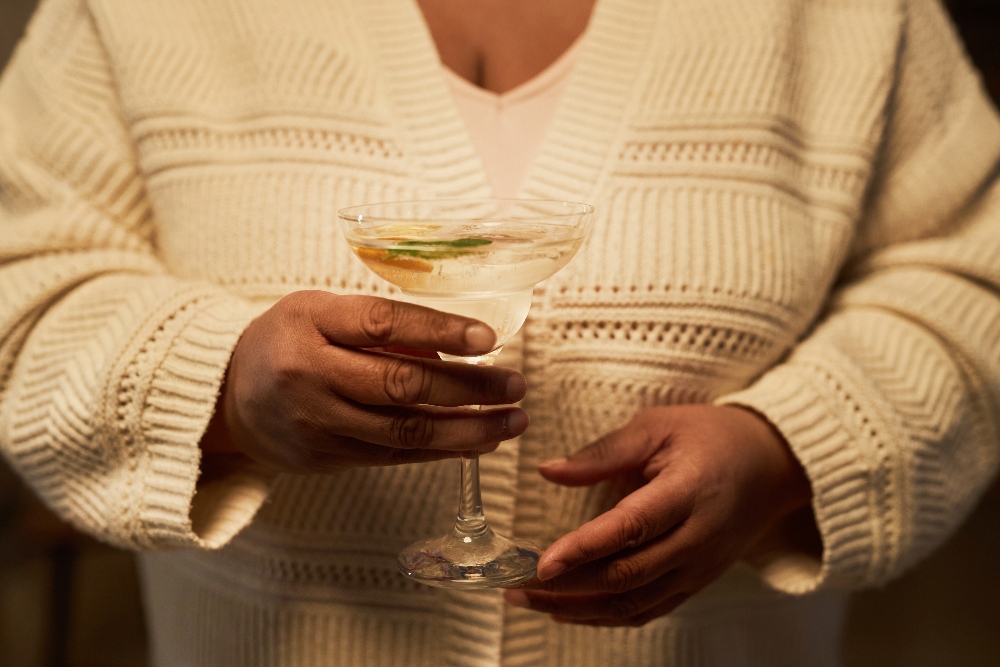 woman holding alcohol