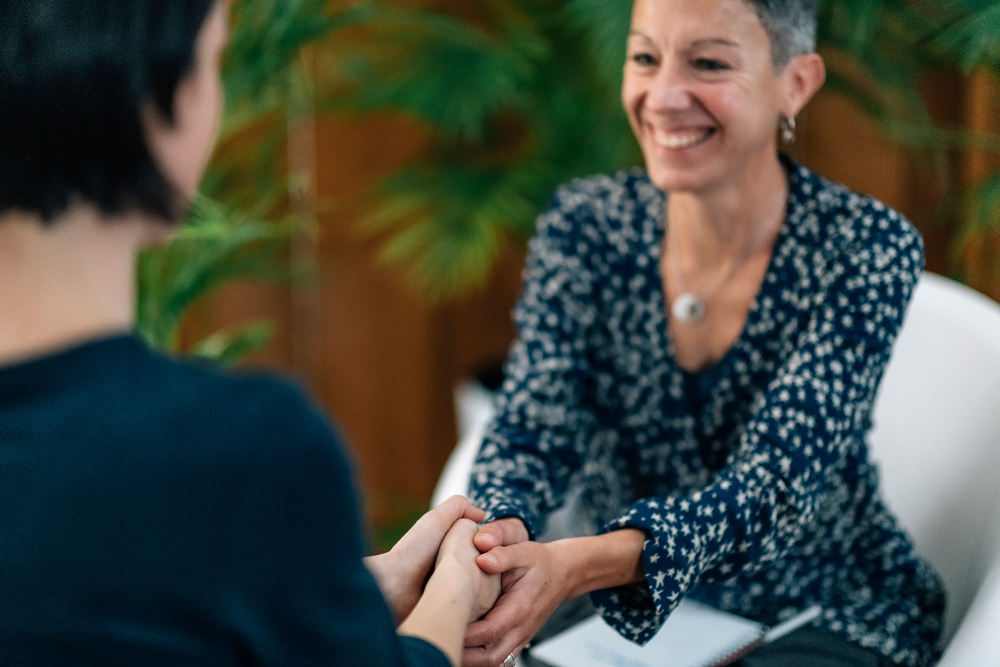 woman speaking with therapist